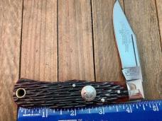 A.G. Russell Texas Ranger Commemorative Lockback 2001 Brown Jigged Bone