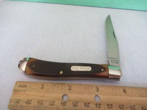 Schrade Rough Saw Cut Delrin USA Made Gunstock LinerLock Trapper Model 194OT