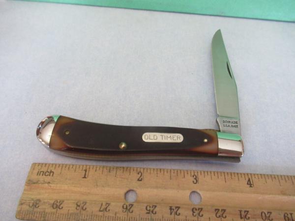 Schrade Rough Saw Cut Delrin USA Made Gunstock LinerLock Trapper Model 194OT