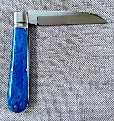 Kroo Blue Kudu Bone Lambsfoot,4" closed, Rwl34,white liners & spacers diamond shield.fileworked Kroo Blue Kudu Bone Lambsfoot,4" closed, Rwl34,white liners & spacers diamond shield.fileworked