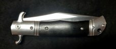 Original CZ Czech Hidden Release knife in rare Ebony Wood handles. Original CZ Czech Hidden Release knife in rare Ebony Wood handles.
