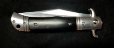 Original CZ Czech Hidden Release knife in rare Ebony Wood handles. Original CZ Czech Hidden Release knife in rare Ebony Wood handles.