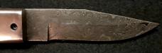 Custom hand made switchblade with Damascus Blade.