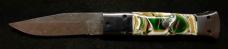 Custom hand made switchblade with Damascus Blade.