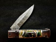Custom hand made switchblade with Damascus Blade.