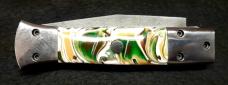 Custom hand made switchblade with Damascus Blade.