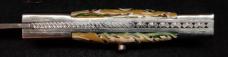 Custom hand made switchblade with Damascus Blade.