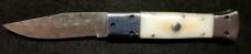 White Linen Micarta with damascus fighting blade, filework 