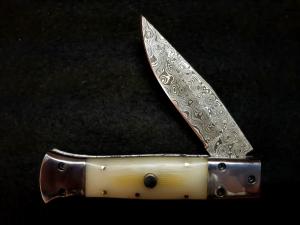White Linen Micarta with damascus fighting blade, filework 