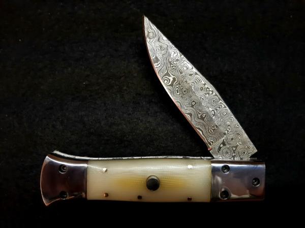 White Linen Micarta with damascus fighting blade, filework 
