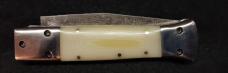 White Linen Micarta with damascus fighting blade, filework 