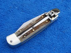 New 5-3/4" Stag Horn Hubertus leverlock auto (110.HH.08) New 5-3/4" Stag Horn Hubertus leverlock auto (110.HH.08)