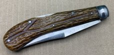 Wilbert Cutlery Co. Chicago. Lockback Saddlehorn Knife with Jig bone handle scales. (880). ....(880)