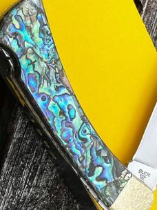 BUCK 110 LEROY REMER CUSTOM PAUA FOLDING HUNTER