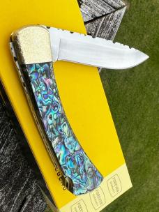 BUCK 110 LEROY REMER CUSTOM PAUA FOLDING HUNTER