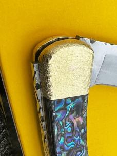 BUCK 110 LEROY REMER CUSTOM PAUA FOLDING HUNTER