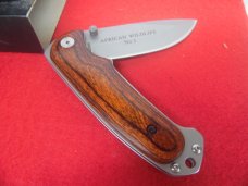 FALKNER AFRICAN WILDLIFE No.1 ELEPHANT WOOD HANDLE ON SS IN BOX COA PRINTED BLADE UNUSED FALKNER AFRICAN WILDLIFE No.1 ELEPHANT WOOD HANDLE ON SS IN BOX COA PRINTED BLADE UNUSED