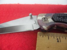 JAGUAR CAMO BUTTON LOCK CAMPING OR DAILY CARRY KNIFE NEVER USED TANTO BLADE JAGUAR CAMO BUTTON LOCK CAMPING OR DAILY CARRY KNIFE NEVER USED TANTO BLADE
