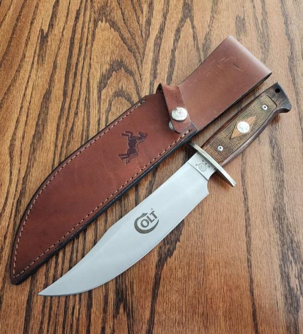 Colt U.S.A. 12 1/2" fixed blade knife C11 SS. Beautiful Brown wood handles. Never used or carried. 