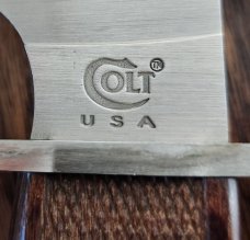 Colt U.S.A. 12 1/2" fixed blade knife C11 SS. Beautiful Brown wood handles. Never used or carried. 