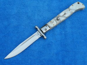 New 11" AKC Roma Swinguard Pearl white handles 