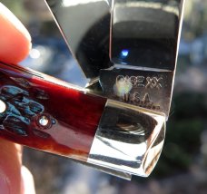 Unused Case XX USA 10 dot 1970 trapper. 5254. Beautiful red bone with no cracks. Snaps both ways.