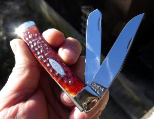 Unused Case XX USA 10 dot 1970 trapper. 5254. Beautiful red bone with no cracks. Snaps both ways.