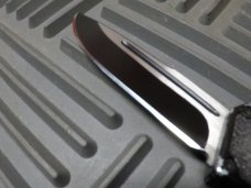 HERETIC OTF "COPY"...BUT WICKED sharp, mirrored edge! HERETIC OTF "COPY"...BUT WICKED sharp, mirrored edge!