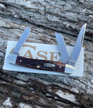 CASE XX ** 2023 MAHOGANY PEACH SEED JIG BONE CARBON STEEL MEDIUM STOCKMAN
