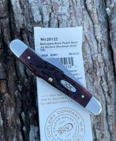 CASE XX ** 2023 MAHOGANY PEACH SEED JIG BONE CARBON STEEL MEDIUM STOCKMAN CASE XX ** 2023 MAHOGANY PEACH SEED JIG BONE CARBON STEEL MEDIUM STOCKMAN