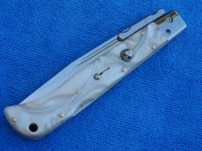 New 11" AKC Roma Swinguard Pearl white handles 
