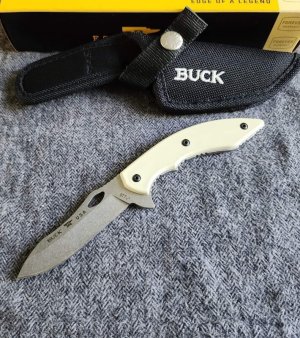 2023 Buck Maverik 877 U.S.A. fixed blade. 7" long. Beautiful Ivory Synthetic handles. NIB