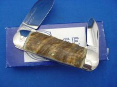 Case XX Classic Sunfish/Toenail Genuine Himalayan Sheep Horn 1 of 4 Knife With Dueling Bull Etch Case XX Classic Sunfish/Toenail Genuine Himalayan Sheep Horn 1 of 4 Knife With Dueling Bull Etch
