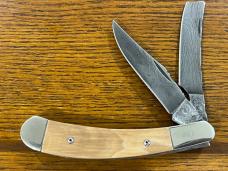 Thompson Center Arms TC No. 1 Ltd Ed Trapper w/Damascus Clip Point & Razor Blades & Mastodon Scales Thompson Center Arms TC No. 1 Ltd Ed Trapper w/Damascus Clip Point & Razor Blades & Mastodon Scales