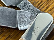 Thompson Center Arms TC No. 1 Ltd Ed Trapper w/Damascus Clip Point & Razor Blades & Mastodon Scales Thompson Center Arms TC No. 1 Ltd Ed Trapper w/Damascus Clip Point & Razor Blades & Mastodon Scales