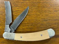 Thompson Center Arms TC No. 1 Ltd Ed Trapper w/Damascus Clip Point & Razor Blades & Mastodon Scales Thompson Center Arms TC No. 1 Ltd Ed Trapper w/Damascus Clip Point & Razor Blades & Mastodon Scales