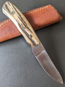 Stag Hunter by William Gordon Defreest has a satin finished blade, .126" blade stock and .879" 