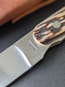 Stag Hunter by William Gordon Defreest has a satin finished blade, .126" blade stock and .879" 