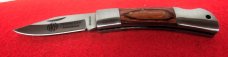 NRA STAINLESS LOCKBACK WOOD SCALES WITH EDGE FROM STORAGE VERY NICE FROM YEARS BACK NRA STAINLESS LOCKBACK WOOD SCALES WITH EDGE FROM STORAGE VERY NICE FROM YEARS BACK