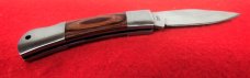 NRA STAINLESS LOCKBACK WOOD SCALES WITH EDGE FROM STORAGE VERY NICE FROM YEARS BACK NRA STAINLESS LOCKBACK WOOD SCALES WITH EDGE FROM STORAGE VERY NICE FROM YEARS BACK