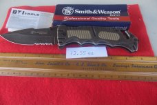 SMITH & WESSON BORDER GUARD CK 33 PART SERRATED 5" TACTICAL IN BOX FROM STORAGE SMITH & WESSON BORDER GUARD CK 33 PART SERRATED 5" TACTICAL IN BOX FROM STORAGE