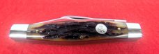 QUEEN CUTLERY CO TITUSVILLE #49 AMBER BONE LARGE STOCKMAN PH-D2 TOOL STEEL MINT YEAR UNKNOWN QUEEN CUTLERY CO TITUSVILLE #49 AMBER BONE LARGE STOCKMAN PH-D2 TOOL STEEL MINT YEAR UNKNOWN