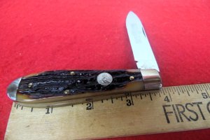 QUEEN CUTLERY CO TITUSVILLE #06L LINER LOCK AMBER BONE TOOL STEEL MINT TEAR DROP JACK YEAR UNKNOWN