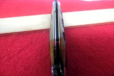 QUEEN CUTLERY CO TITUSVILLE #06L LINER LOCK AMBER BONE TOOL STEEL MINT TEAR DROP JACK YEAR UNKNOWN
