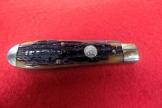 QUEEN CUTLERY CO TITUSVILLE #06L LINER LOCK AMBER BONE TOOL STEEL MINT TEAR DROP JACK YEAR UNKNOWN