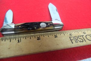 QUEEN CUTLERY CO TITUSVILLE #64 AMBER BONE TOOL STEEL 3-1/2" MINT CANOE YEAR UNKNOWN