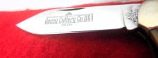 QUEEN CUTLERY CO TITUSVILLE #64 AMBER BONE TOOL STEEL 3-1/2" MINT CANOE YEAR UNKNOWN