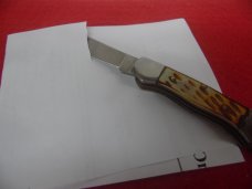 ROUGH RIDER AMBER BONE 3-3/4" RAZOR SHARP STEEL WILL CUT LOCKBACK UNUSED FROM STORAGE ROUGH RIDER AMBER BONE 3-3/4" RAZOR SHARP STEEL WILL CUT LOCKBACK UNUSED FROM STORAGE