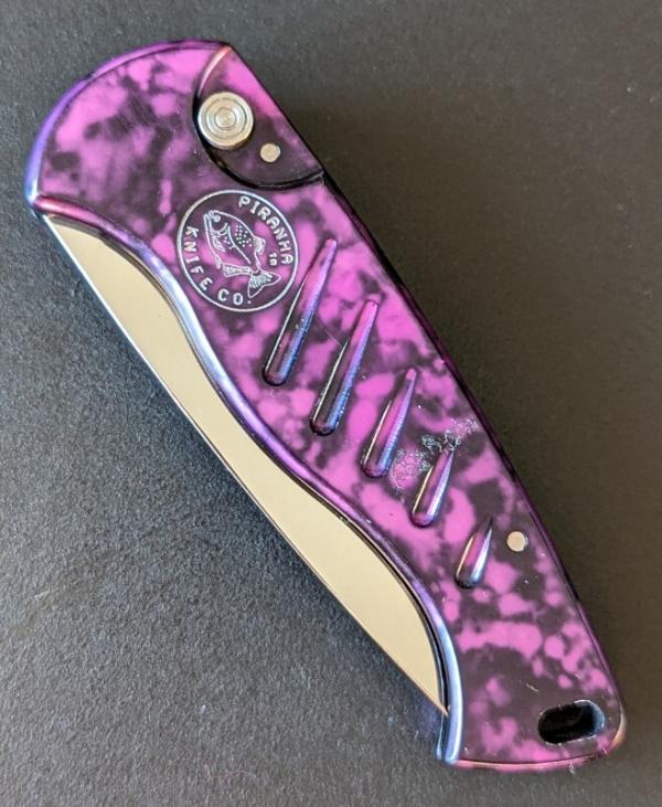 Piranha Fingerling Automatic Knife Plum Swirl (2.5" Mirror) Piranha Fingerling Automatic Knife Plum Swirl (2.5" Mirror)