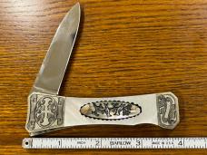 Parker Cut. Co. Desperado Scrimshawed Single-Blade Lockback Knife w/MOP Scales & Engraved Bolsters Parker Cut. Co. Desperado Scrimshawed Single-Blade Lockback Knife w/MOP Scales & Engraved Bolsters